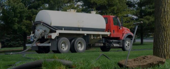 septic tank truck driving