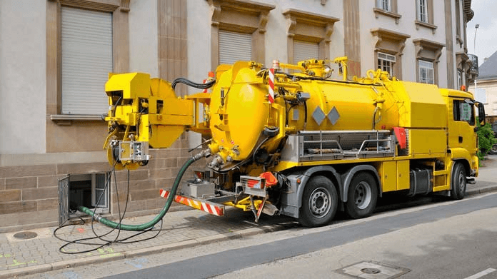 Yellow septic truck| Growth Opportunities in Septic Cleaning Business| ServiceCore software for portable restroom & dumpster companies