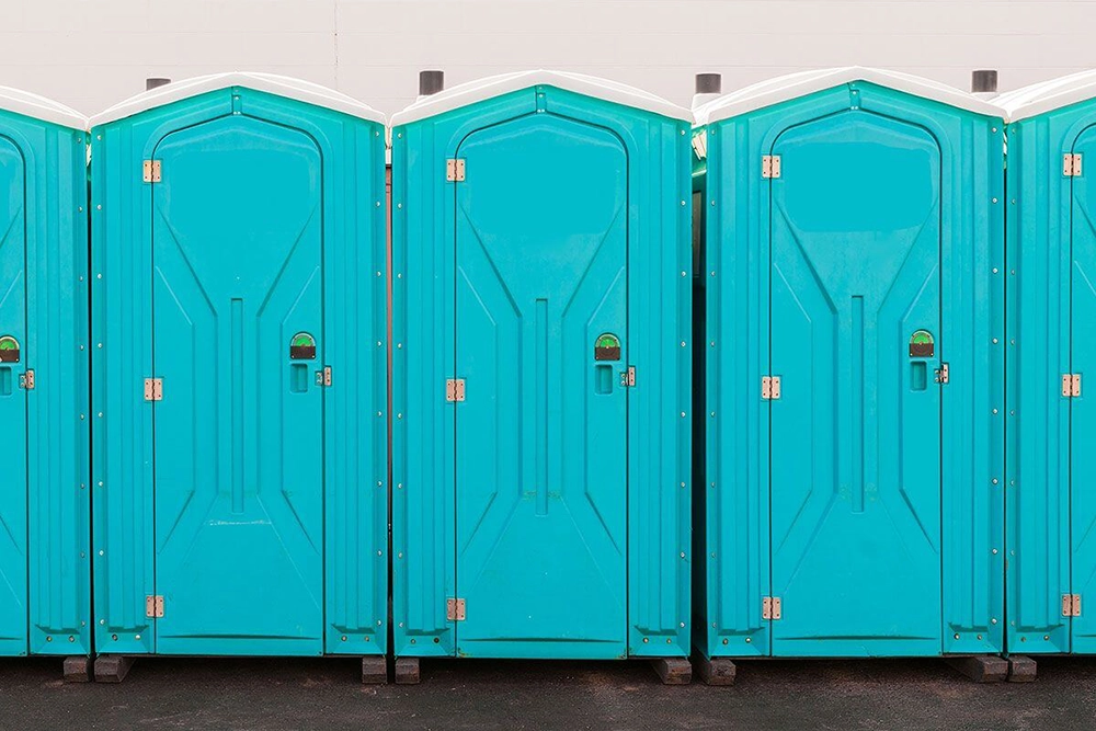 Teal porta potties - How Many Toilets Do You Need to Start Portable Restroom Business? - ServiceCore Blog