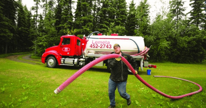 septic tank tech carrying hose| Growth Opportunities in Septic Cleaning Business| ServiceCore software for portable restroom & dumpster companies