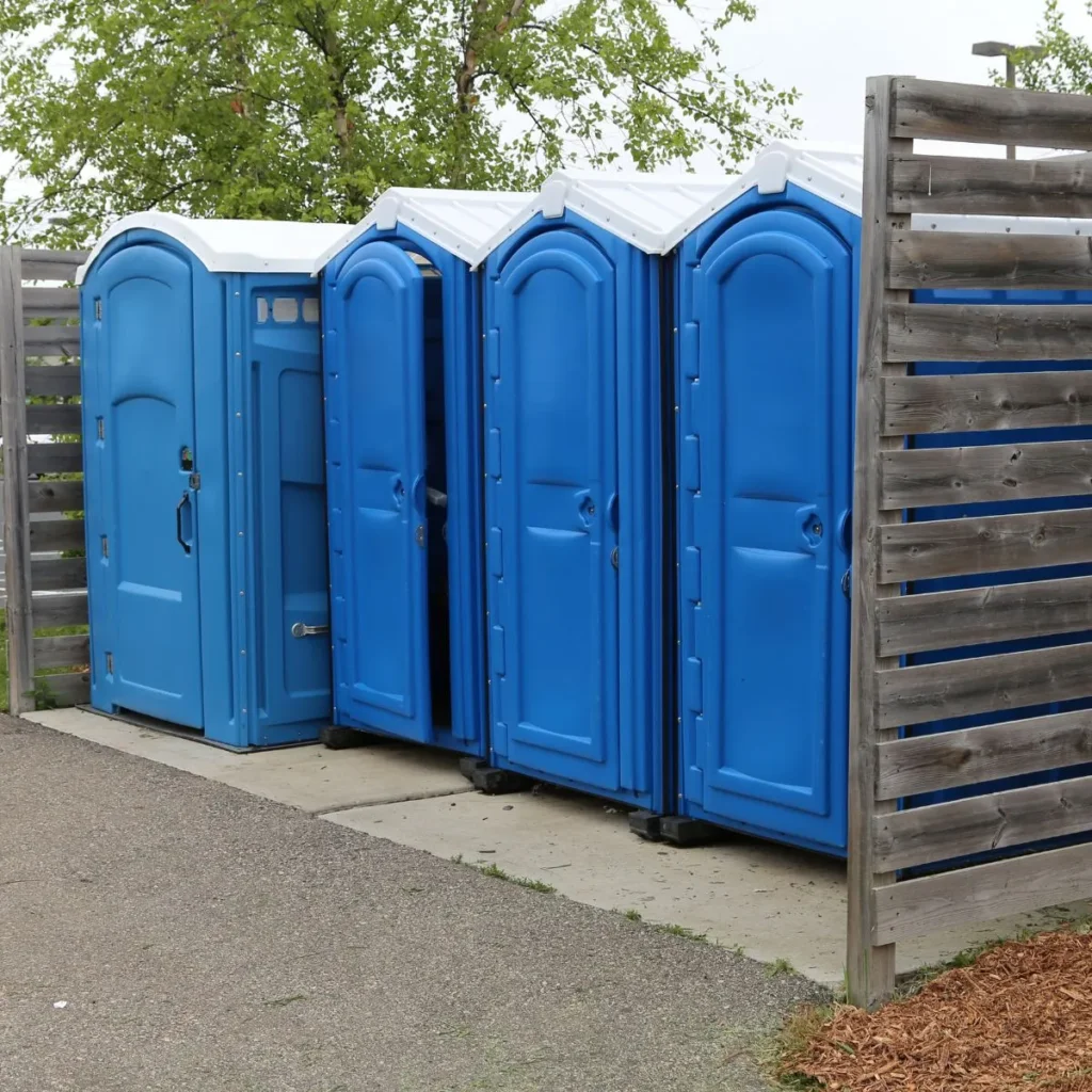 4 porta potties adjacent - Glossary of Septic Pumping Terms -ServiceCore 