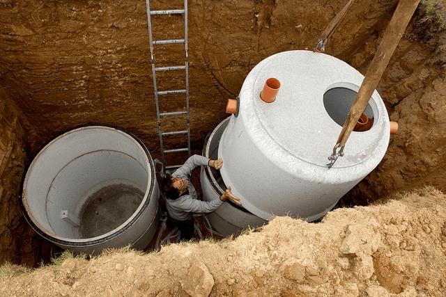 septic system being dug up | pros of owning a septic waste company | ServiceCore software for portable restroom & dumpster companies”